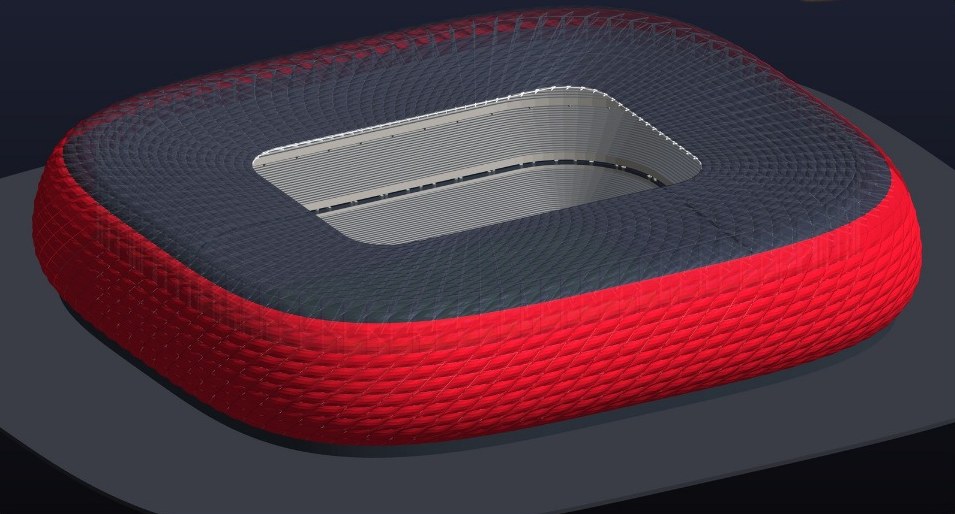 Modelo en Revit de un estadio con fachada de cojines rojos, creado por Claude a partir de una foto.